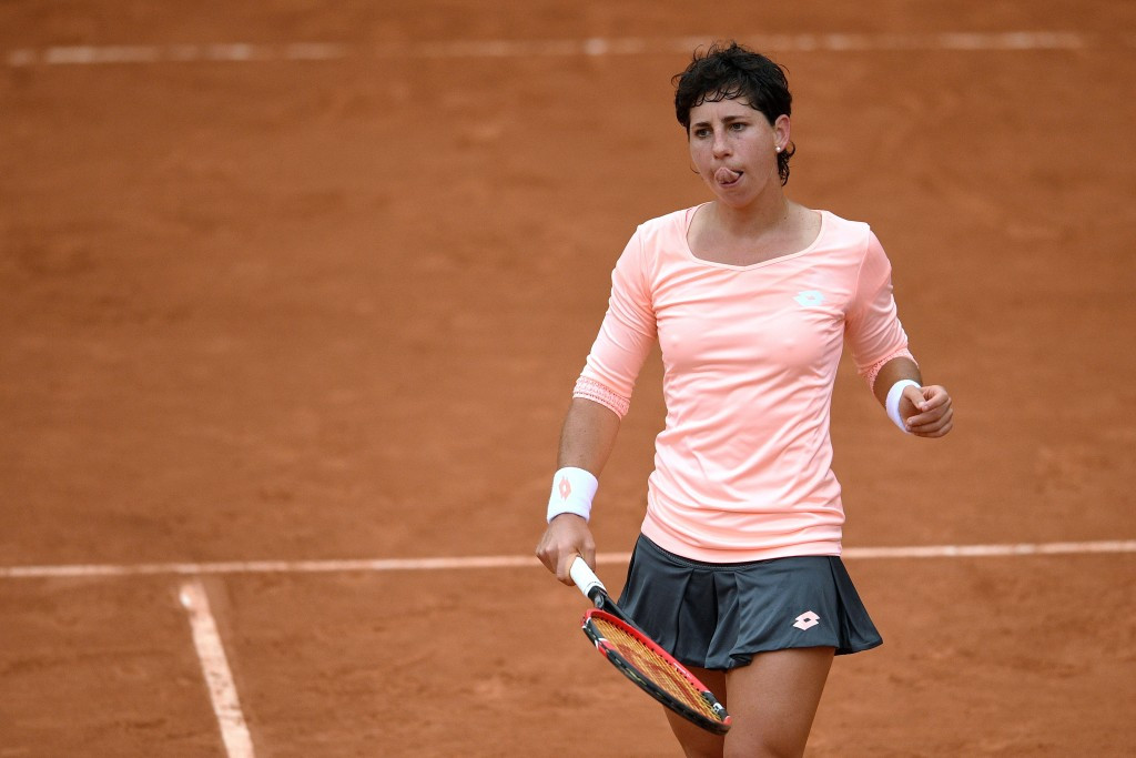 Spanish 12th seed Carla Suárez Navarro suffered a shock defeat against unseeded Kazakh Yulia Putintseva to miss out on the chance of facing Williams in the last eight ©Getty Images
