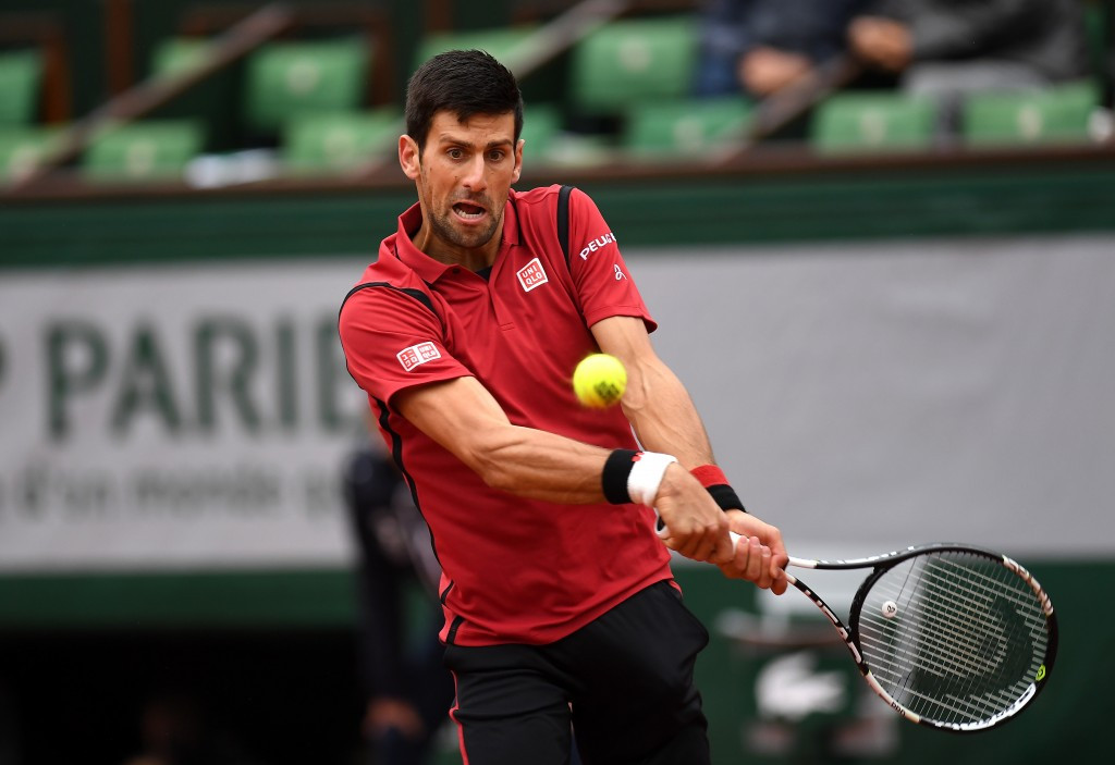 Top seeds Djokovic and Williams advance to semi-finals at French Open