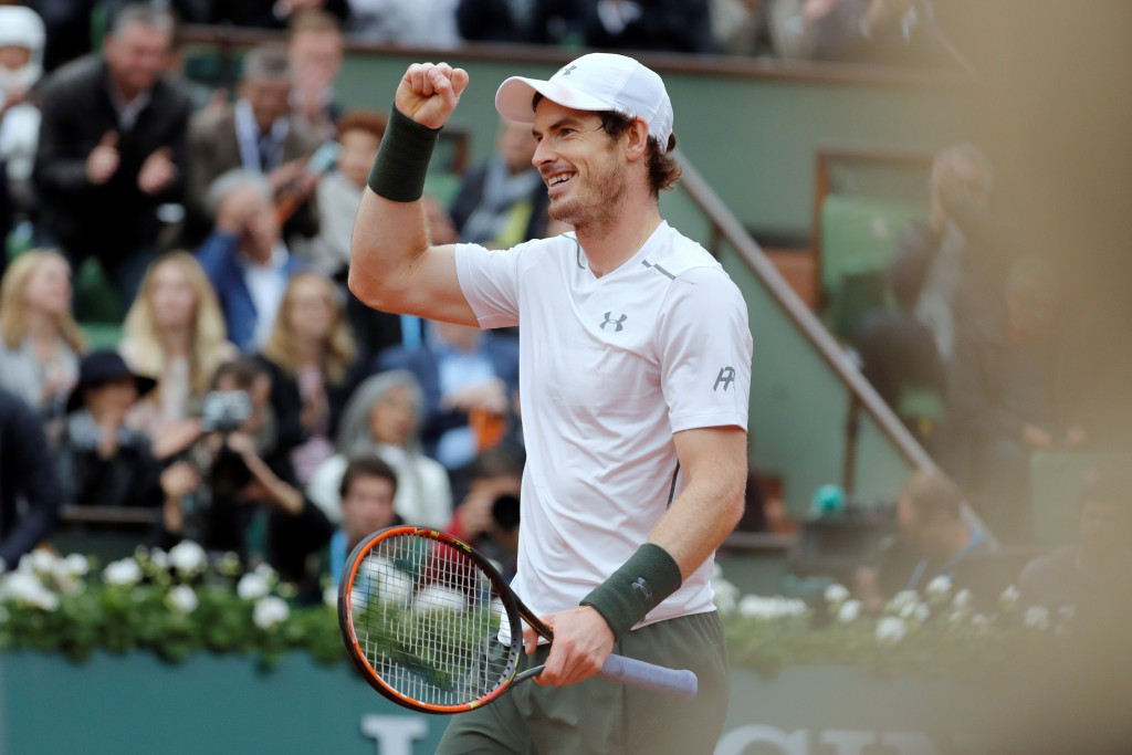 Andy Murray celebrates after reaching his first French Open final with victory over defending champion Stan Wawrinka ©Getty Images