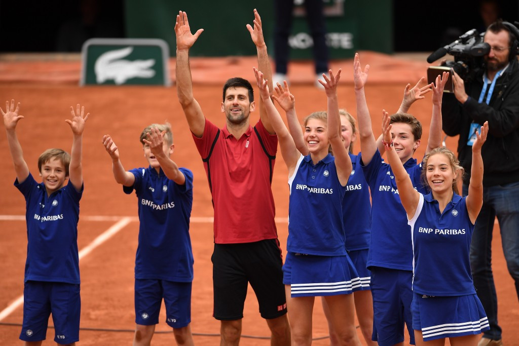 Djokovic celebrated his victory with the ball boys and girls ©Getty Images