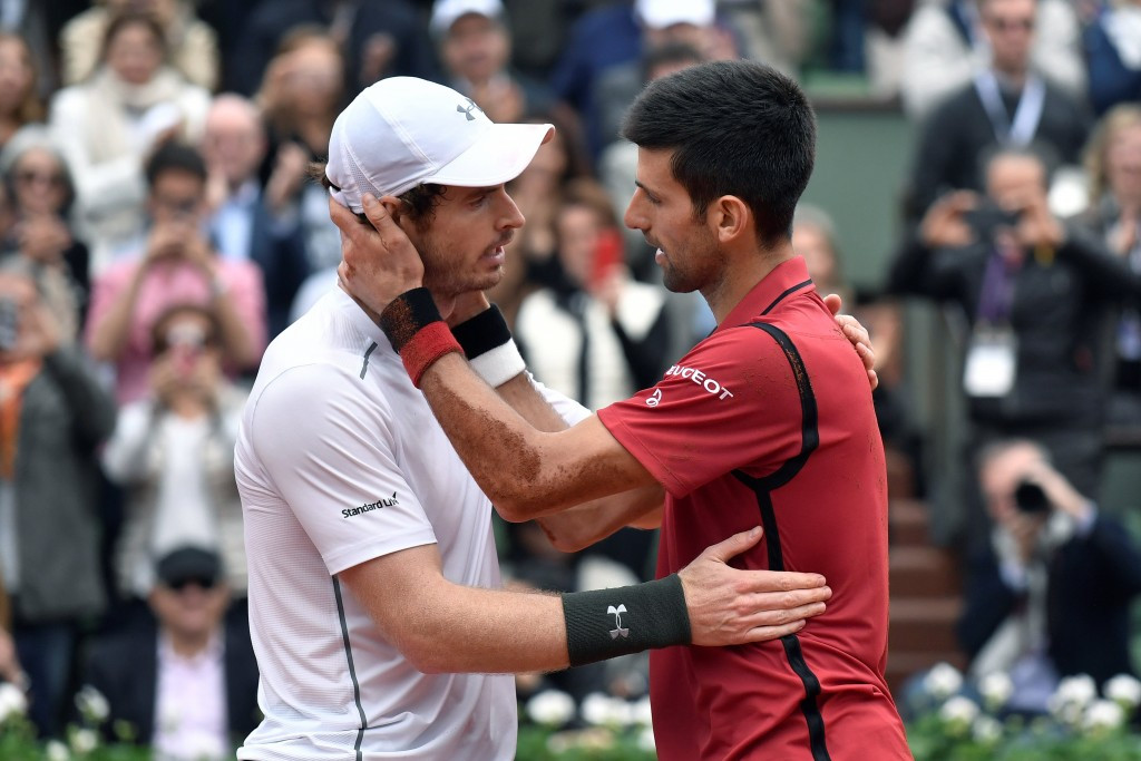 Having become the first man since Australia’s Rod Laver in 1969 to hold all four Grand Slams simultaneously, he then comforted Murray in defeat ©Getty Images