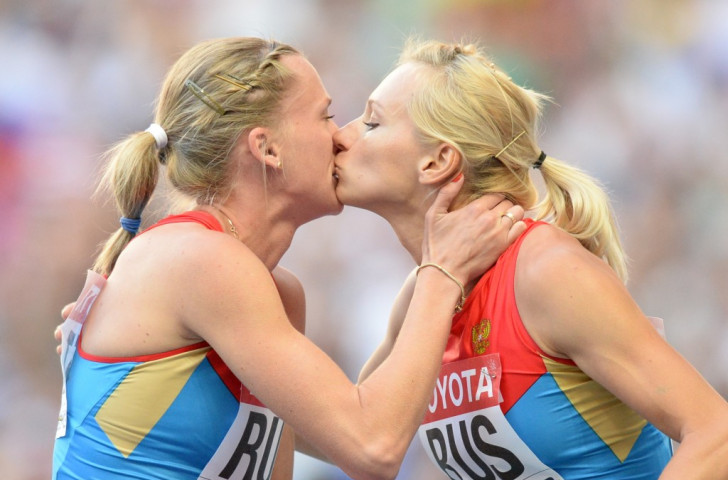 Tatyana Firova pictured right kissing team-mate Kseniya Ryzhova after victory in the 4x400 metres final at the 2013 IAAF World Championships in Moscow, has said athletes should be allowed to take banned substances ©Getty Images