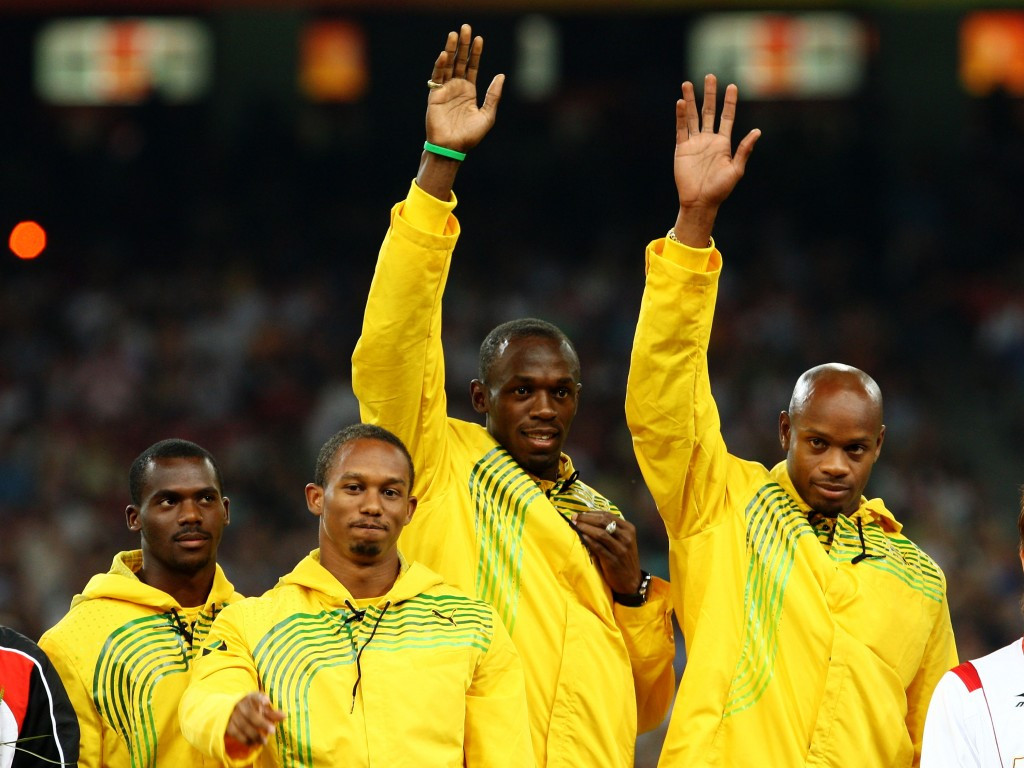 Nesta Carter (left) celebrating gold with his Jamaican team-mates at Beijing 2008 ©Getty Images