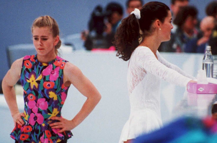 Tonya Harding (left) and rival Nancy Kerrigan, pictured in practice before the 1994 Winter Games. Harding was later banned from skating for life for her connection to the attack on Kerrigan before the Games