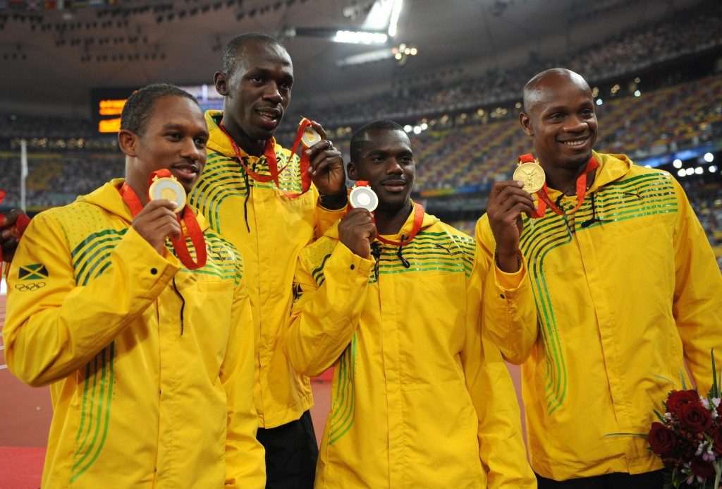 Nesta Carter (centre, right) celebrating gold with his Jamaican team-mates at Beijing 2008