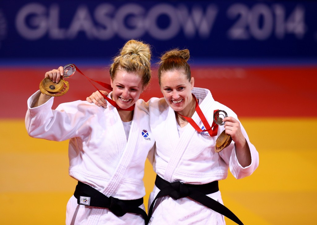 Stephanie Inglis (left) finished as the runner-up in the women's under 57kg category at the Glasgow 2014 Commonwealth Games