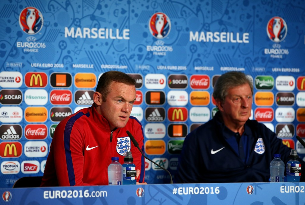 England captain Wayne Rooney (left) and manager Roy Hodgson (right) have appealed for fans to behave