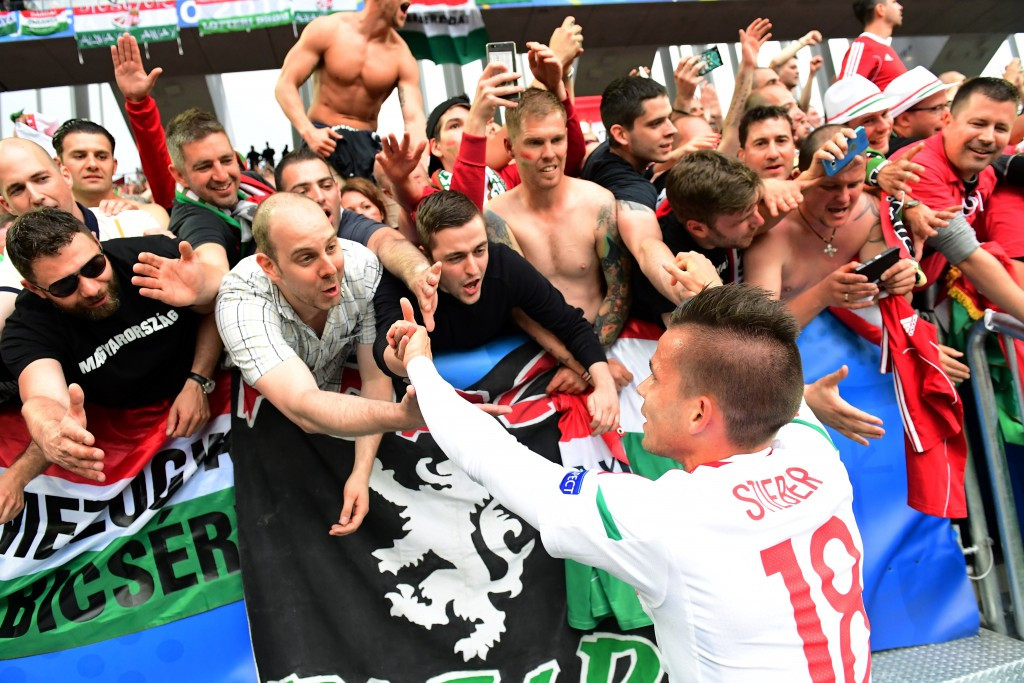 Hungary's Zoltan Stieber celebrates with fans after helping his country to a 2-0 Group F victory against Austria at the Stade de Bordeaux ©Getty Images