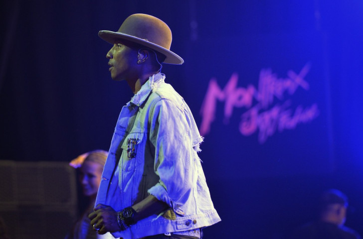 United States singer Pharrell Williams performs on stage during the 48th Montreux Jazz Festival last July