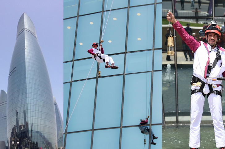 Azerbaijani alpinist Rinat Ragimkhanov abseiled down the iconic Flame Towers with the Torch