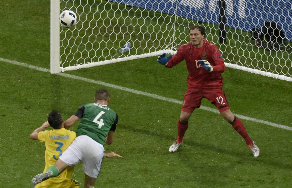 Gareth McAuley's bullet header helped Northern Ireland record a 2-0 win over Ukraine