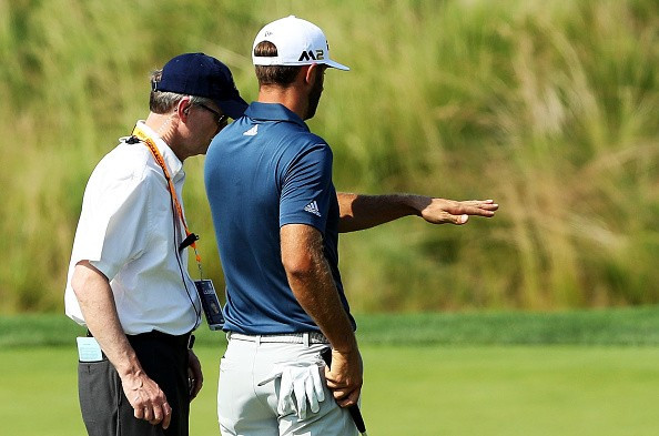 Dustin Johnson was involved in a controversial incident on the fifth hole which led to him being given a one-shot penalty after he had finished his round