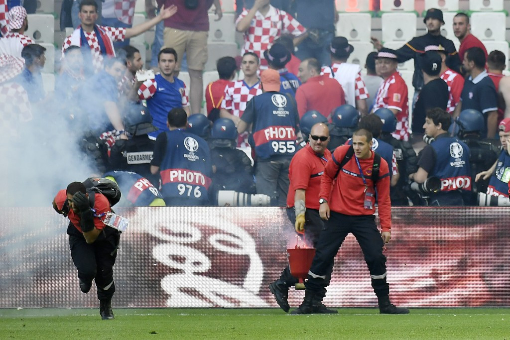 UEFA fine Croatian Football Federation and threaten ticket sanctions following fan violence in draw with Czech Republic
