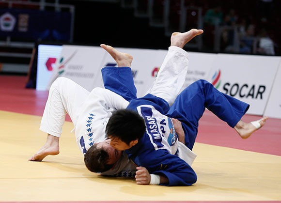 Adrian Gomboc was another athlete to secure their maiden IJF title as the Slovenian brought a halt to the Japanese dominance with victory over Masaya Asari ©IJF
