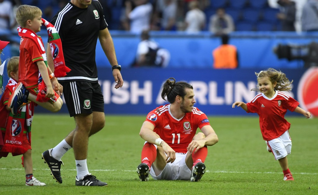 Gareth Bale was again the star for Wales and his daughter Alba Viola wanted to help him celebrate ©Getty Images