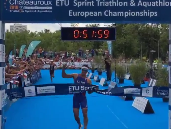 Vincent Luis crosses the line to celebrate a home European Championship victory ©French Triathlon