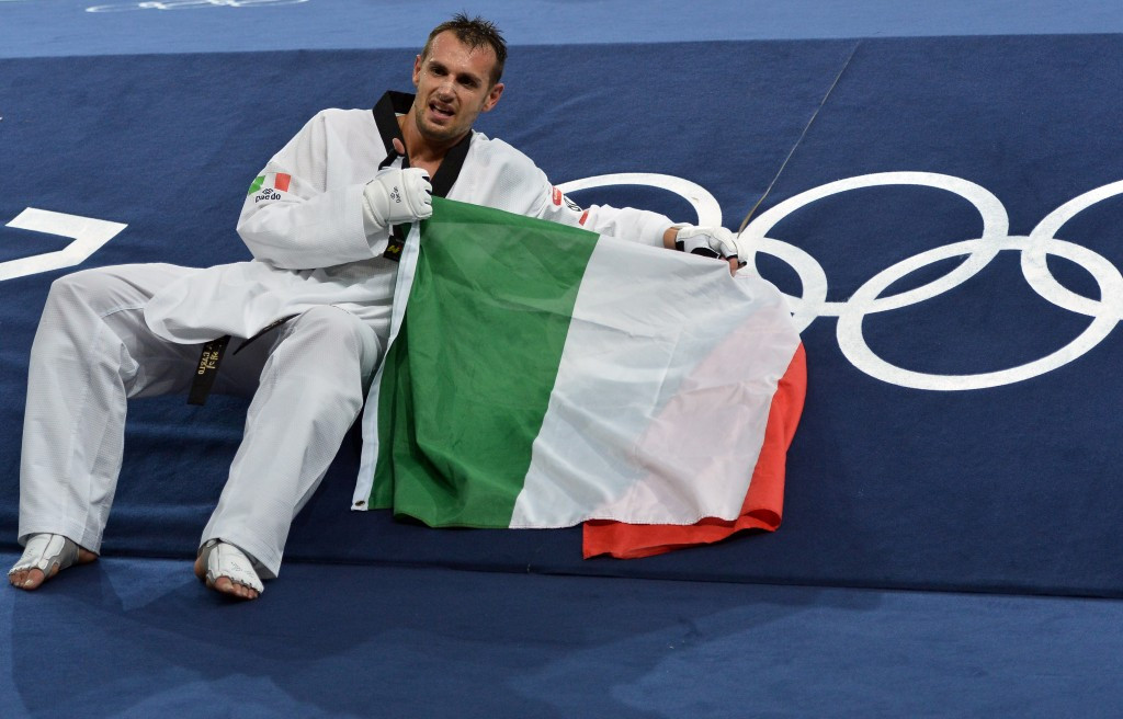 Carlo Molfetta, celebrating his Olympic gold medal at London 2012, has been voted as one of two athlete representatives of the FITA Federal Council ©Getty Images