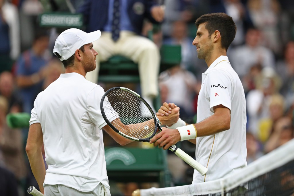 Adrian Mannarino (left) congratulates Novak Djokovic (right) following his victory ©Getty Images