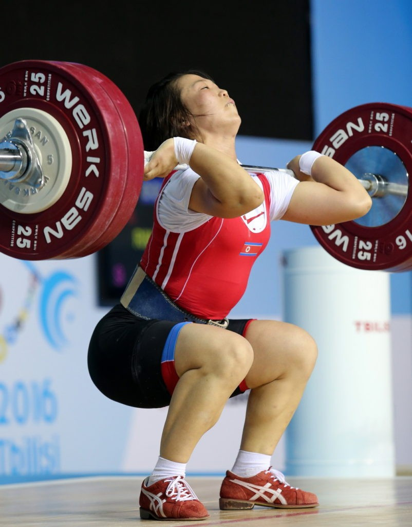 North Korea’s Rim Un Sim won all three gold medals in the women's 63kg category ©IWF