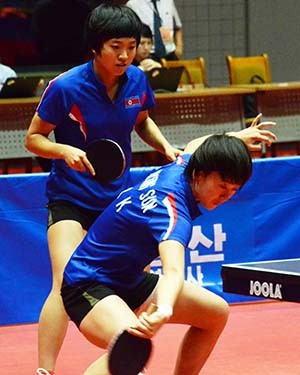 Kim and Ri had earlier put their singles rivalry aside to successfully defend their women’s title ©North Korea Table Tennis Association