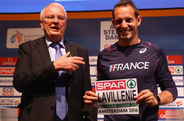 Olympic pole vault champion Renaud Lavillenie, pictured alongside European Athletics President Svein Arne Hansen displaying the name bibs which bear the words 