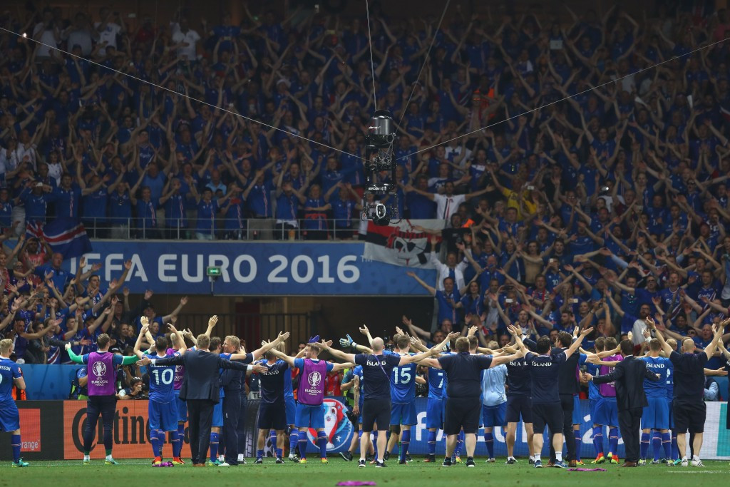 Iceland players and supporters delivering their trademark celebration ©Getty Images