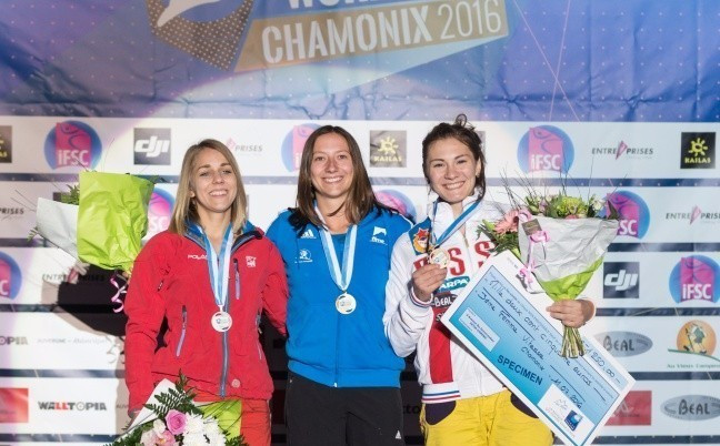 Slovenia's Janja Garnbret overcame tough weather conditions to win the gold medal in the women's lead event ©IFSC
