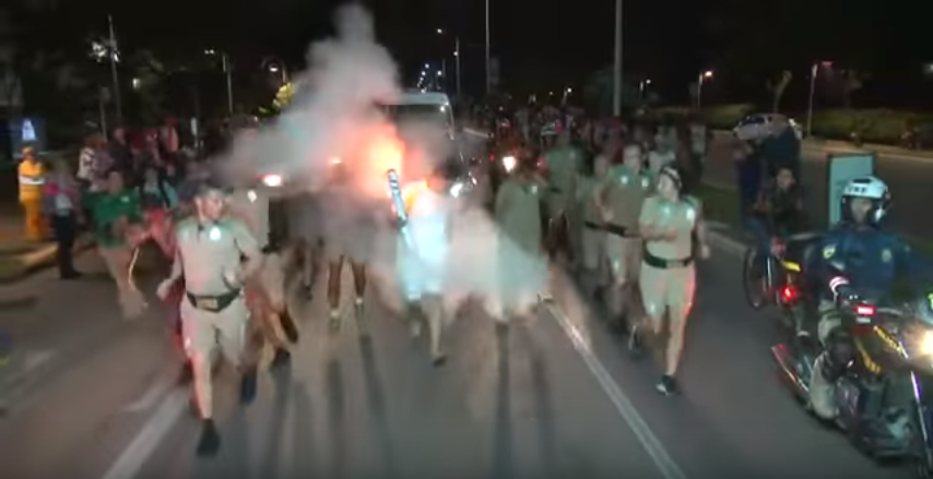 Protester attempts to put out Rio 2016 Olympic flame with fire extinguisher