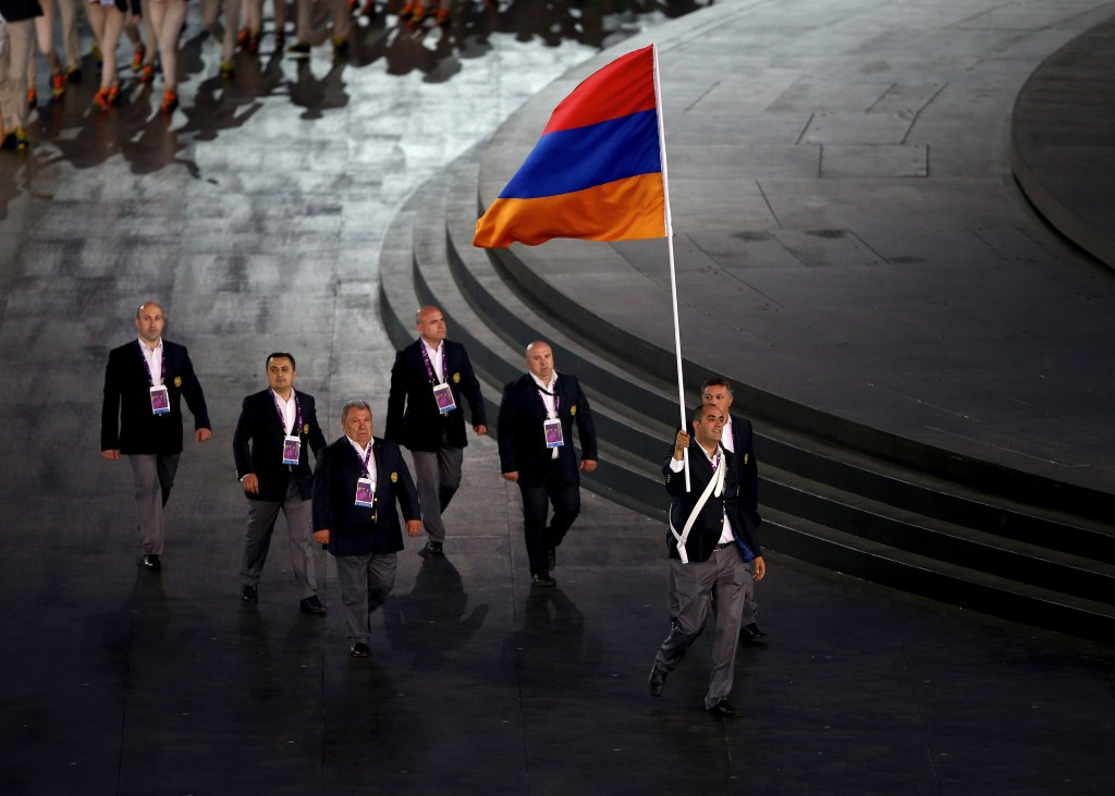 Armenia's entrance in the athlete's parade was greeted with boos and cheers from large parts of the Azerbaijani crowd