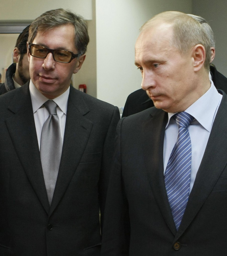 Alfa-Bank head Petr Aven (left) pictured with Russian President Vladimir Putin ©Getty Images