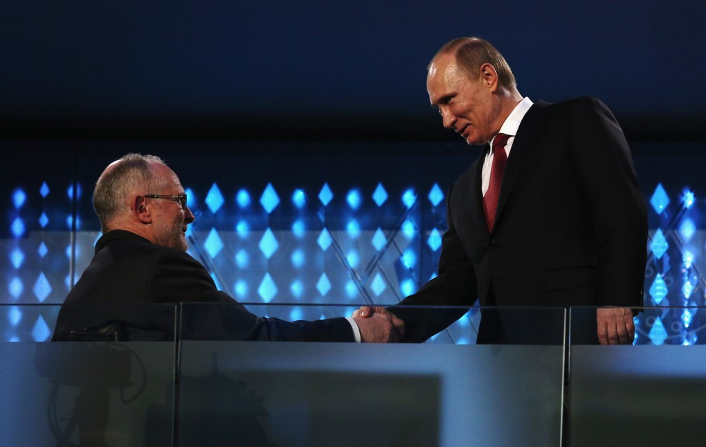 IPC President Sir Philip Craven, pictured here shaking hands with Russian President Vladimir Putin during the Sochi 2014 Paralympic Games Closing Ceremony, said the findings of the McLaren Report mark a very dark day for sport ©Getty Images