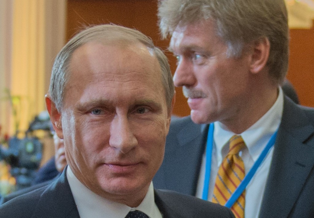 Russian Presidential spokeman Dmitry Peskov (right), pictured here with Vladimir Putin, says Vitaly Mutko is not mentioned as an actual perpetrator in WADA's report ©Getty Images