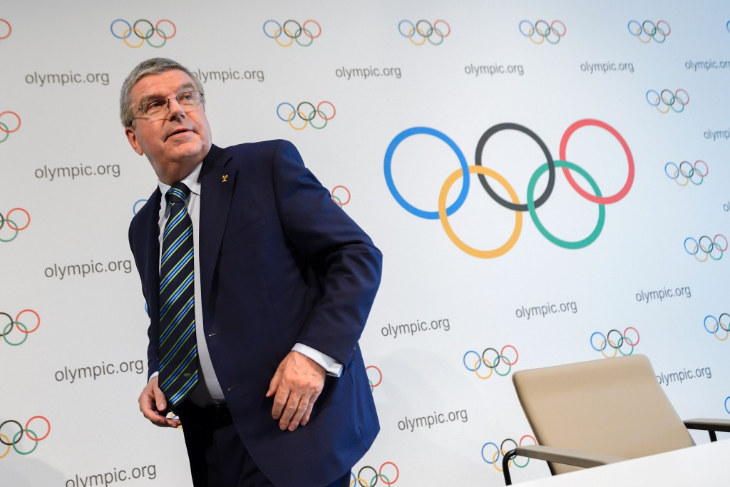 President Thomas Bach's IOC are considering legal options for a possible total ban on Russia ©Getty Images