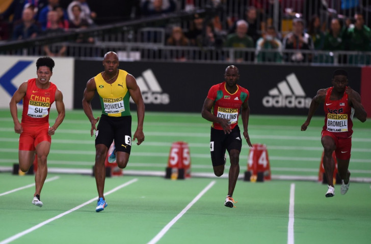 Kim Collins, pictured second right at the IAAF World Indoor Championships in Portland, Oregon, has been cleared to compete in his fifth Olympics after healing a rift with the St Kitts and Nevis Olympic Committee ©Getty Images
