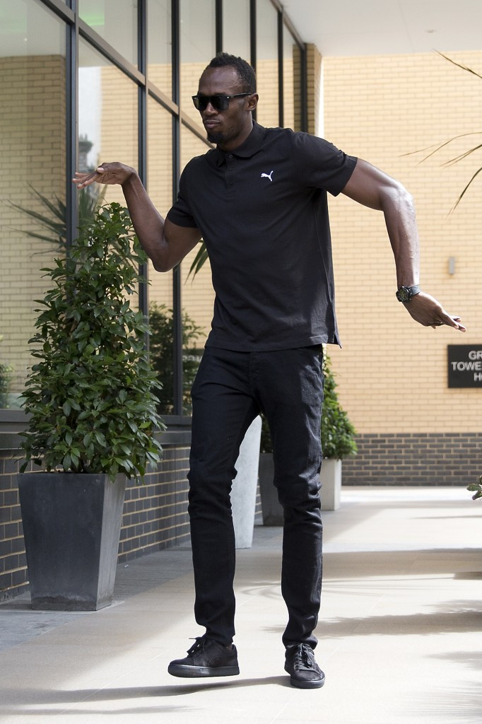 A perky Usain Bolt poses for photographers before today's press conference for the Muller Anniversary Games in London ©Getty Images
