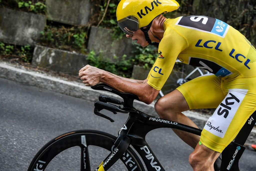 Froome wins uphill time trial to pull further clear at Tour de France