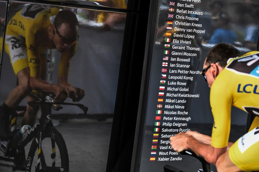 In pictures: Froome wins time trial to increase Tour de France lead