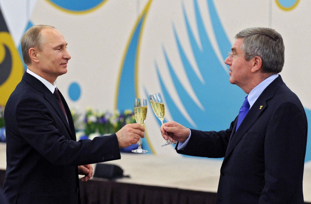 Vladimir Putin (left) was among the first to congratulate Thomas Bach after his election as IOC President ©Getty Images