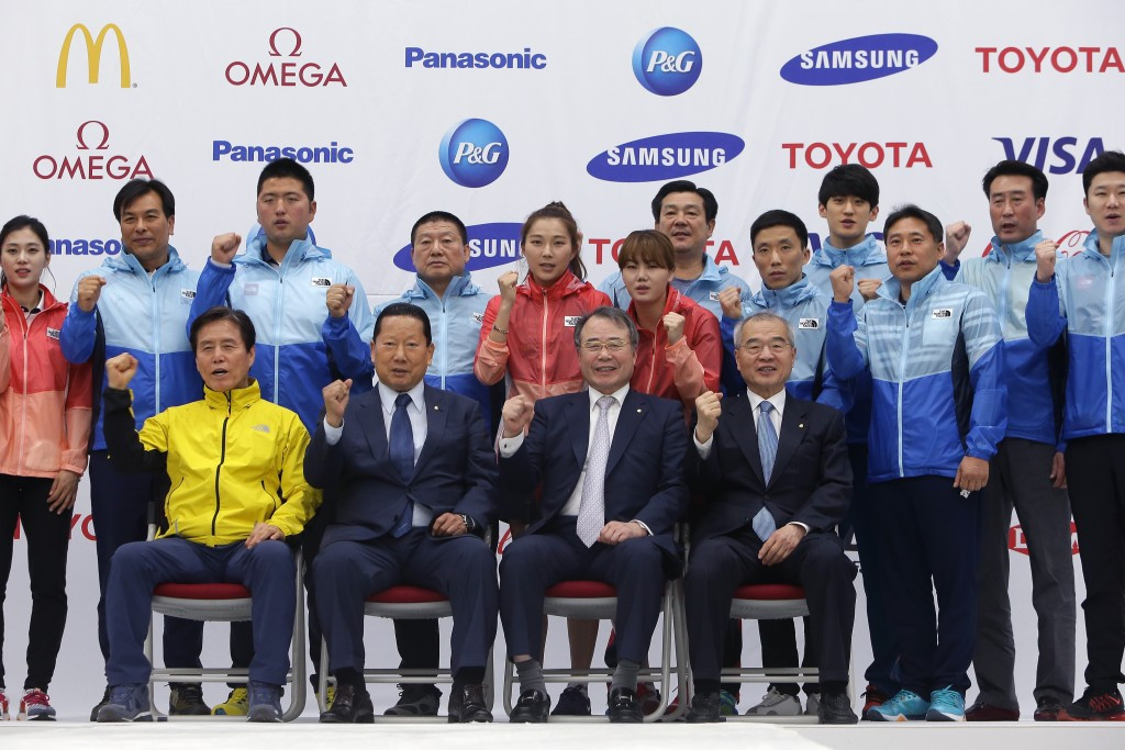 Kang Young-joong (second right) is due to fly to the Games in Kim's absence ©Getty Images