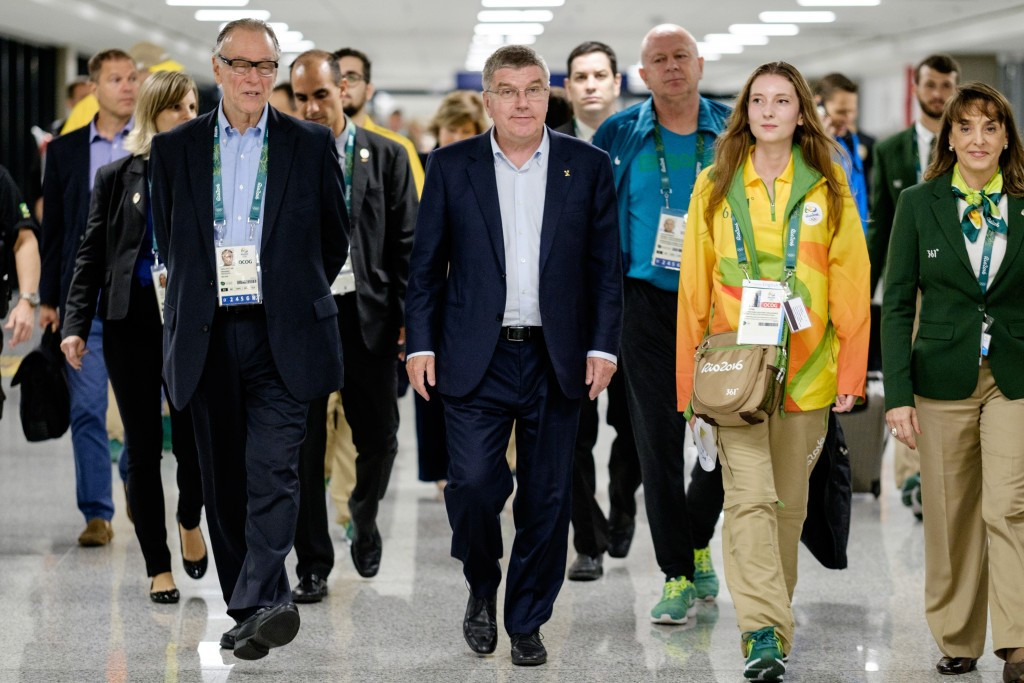 IOC President Thomas Bach (centre) has been labelled as “part of the doping system” by Robert Harting ©Getty Images