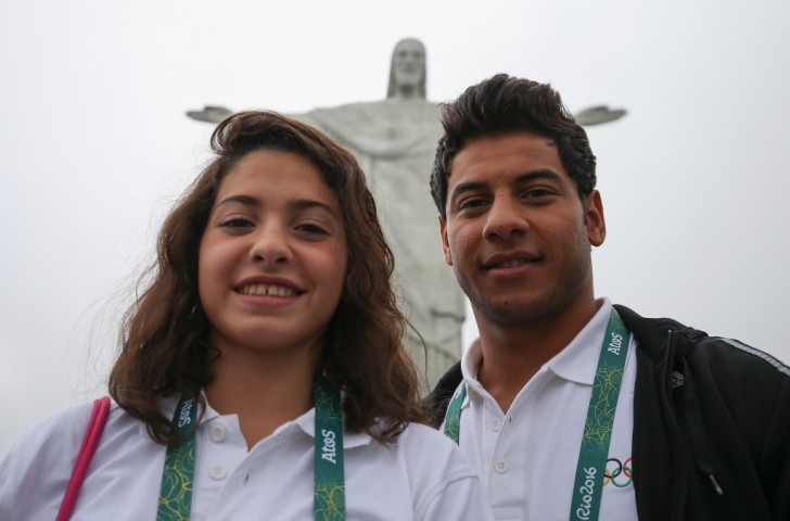 Yusra Mardini and fellow Syrian swimmer Rami Anis pose for the camera after arriving in Rio to compete for the Refugee Olympic Team ©Getty Images