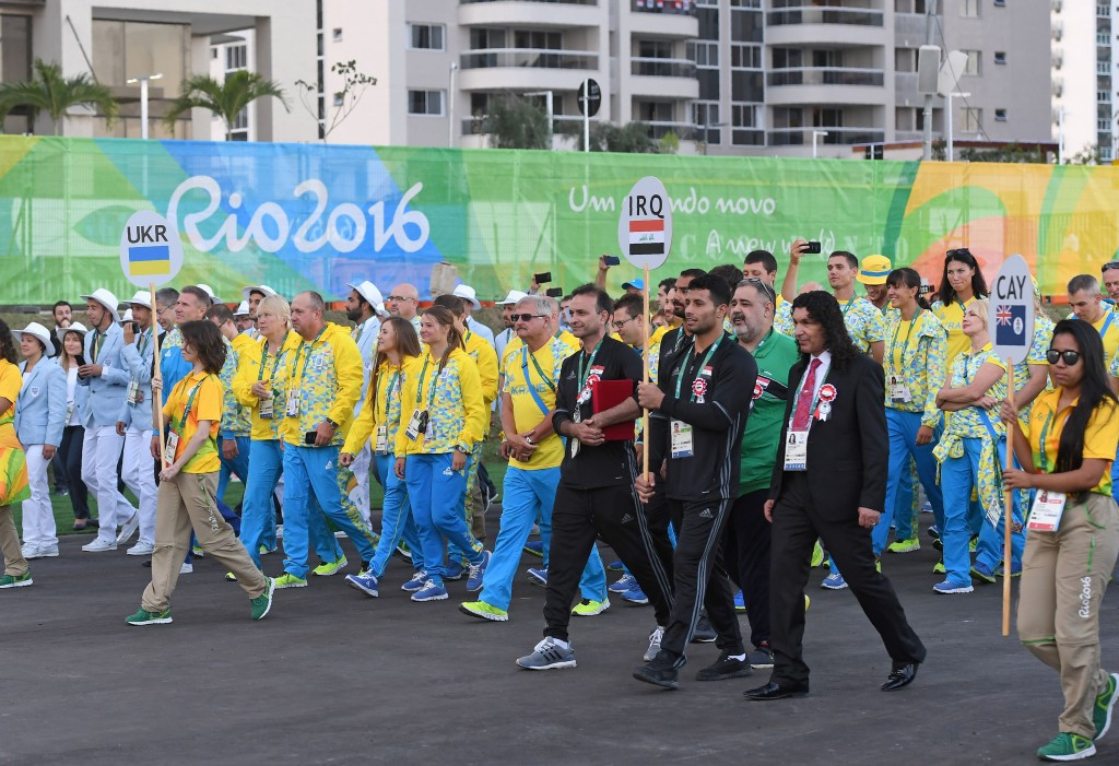 Athletes from Uruguay, Ukraine and Iraq attend a welcome ceremony in the Athletes' Village ©Getty Images