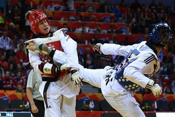 Bianca Walkden, who won world gold for Britain last month, is used to the awkwardness of watching her boyfriend Cook fight against her team-mates