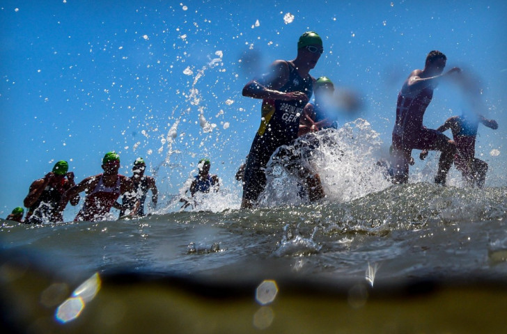 Athletes exit the water in the men's triathlon final at Bilgah Beach ©Getty Images