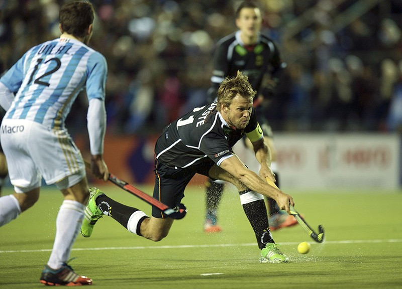 Olympic champions Germany proved too strong for Argentina and silenced the home crowd with a comfortable 4-1 win