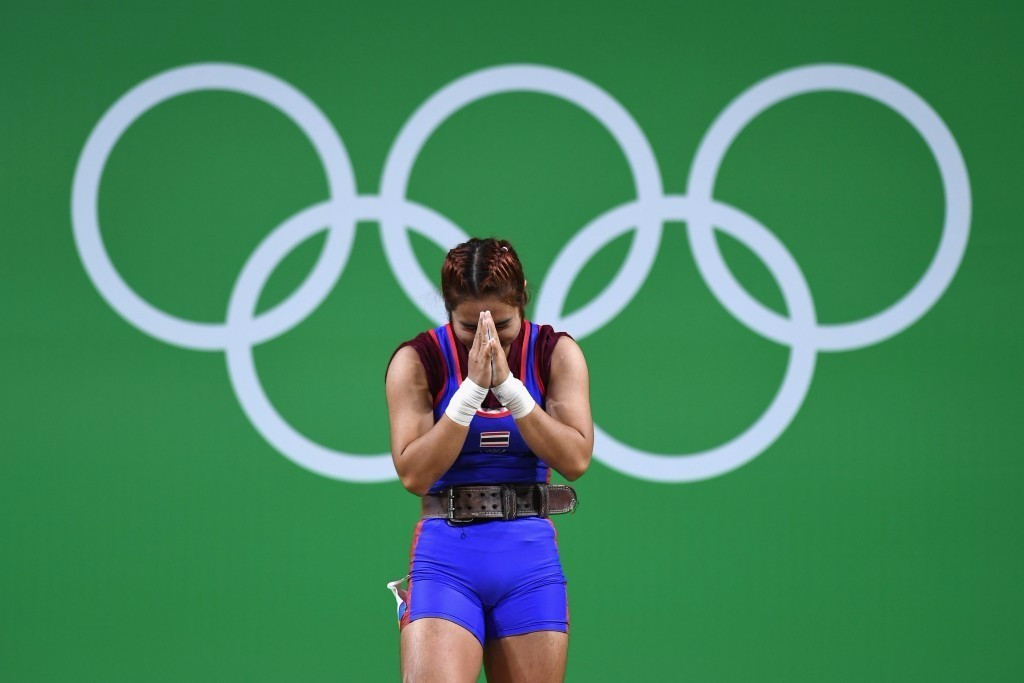 Thailand's Sopita Tanasan cannot believe she has won a gold medal in the women's weightlifting 48kg category ©Getty Images 