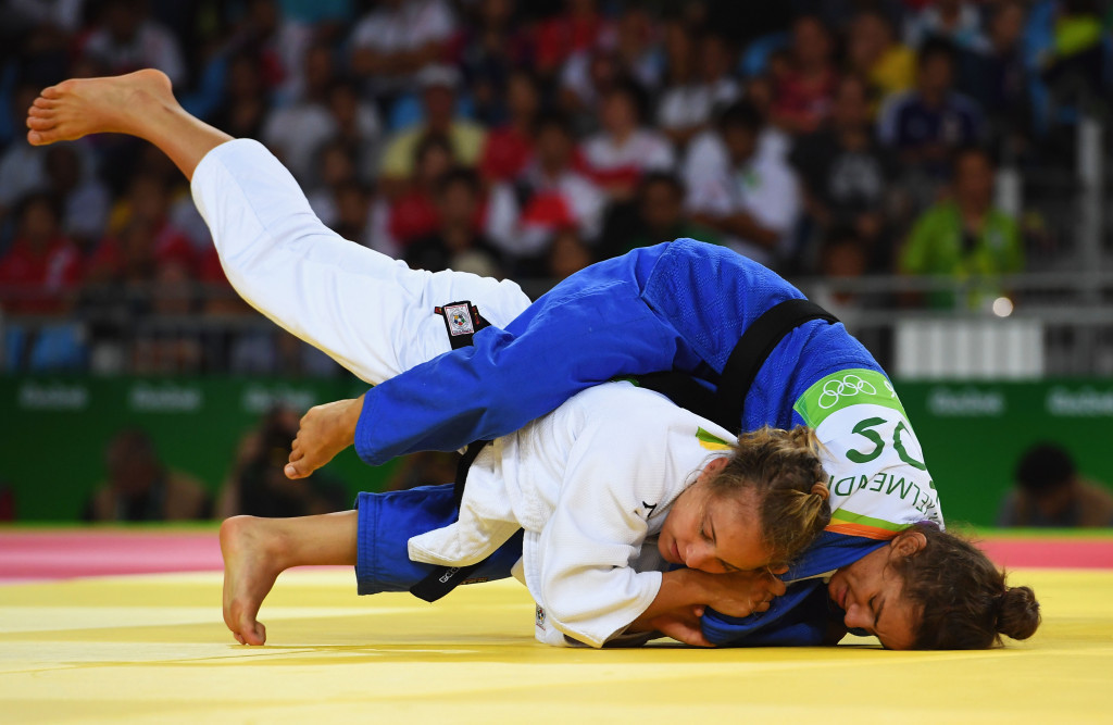 Majlinda Kelmendi beat Italy's Odette Giuffrida in the final of the under 52kg to win an historic Olympic gold medal for Kosovo and which was presented by IOC President Thomas Bach ©Getty Images