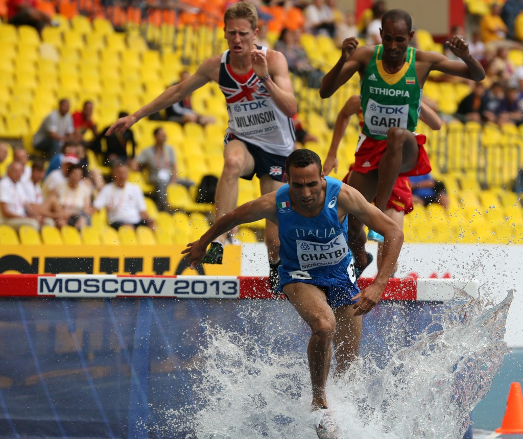 Jamel Chatbi leads over the water jump in the 3000m steeplechase at the 2013 IAAF World Championships in Moscow ©Getty Images