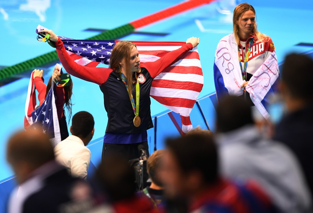 Lilly King (centre) celebrates 100m breaststroke gold alongside Yuliya Efimova ©Getty Images