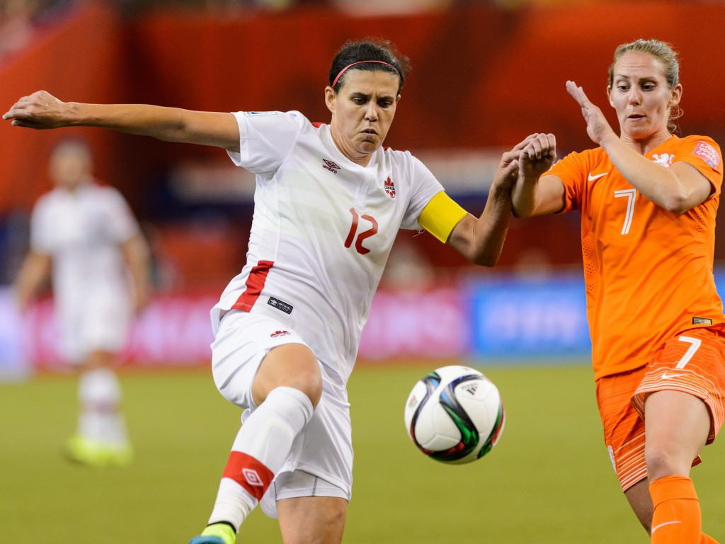 Hosts Canada are also through despite being held to a 1-1 draw by The Netherlands